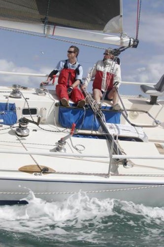 Cadi with John steering and son David © Teri Dodds http://www.teridodds.com